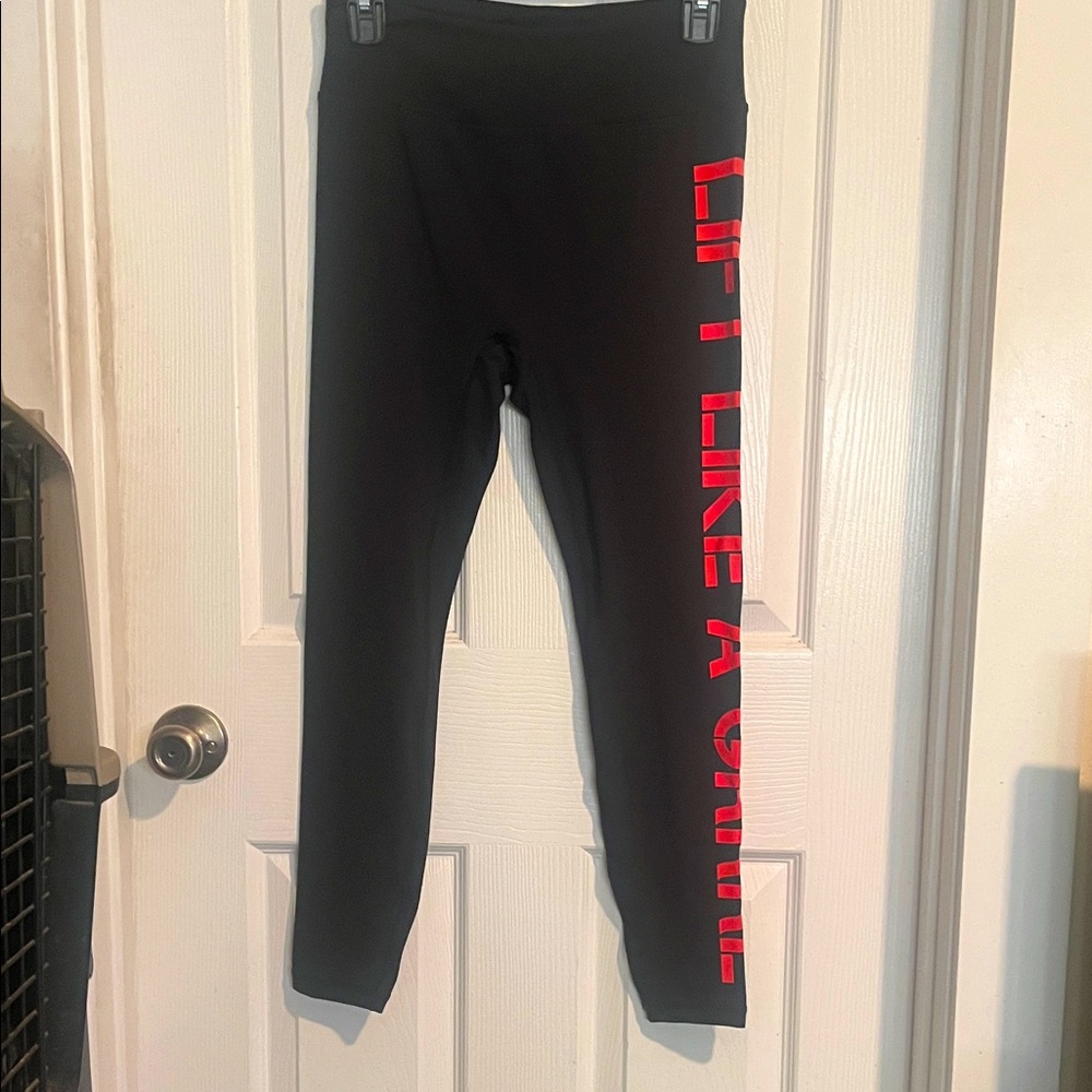 Grrrl Black CT free leggings,with Lift Like a Grrrl printed in red down one leg.